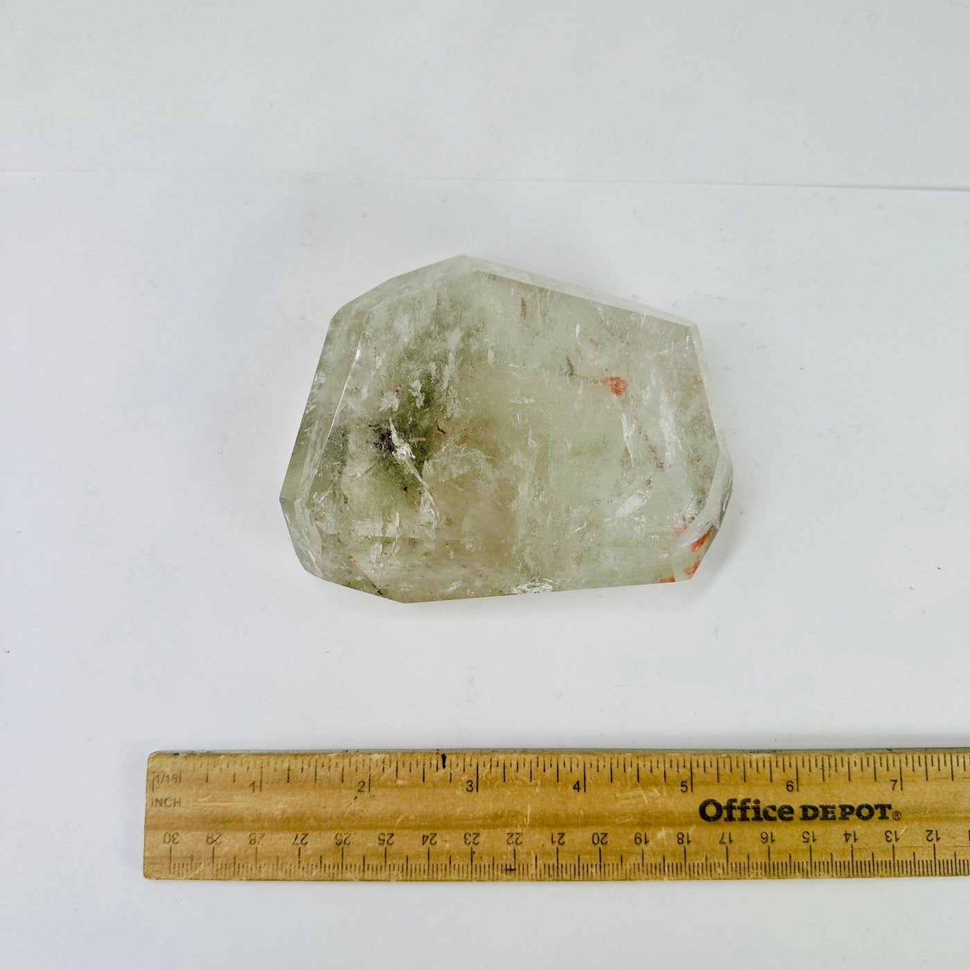 Polished Crystal Quartz Freeform with Inclusions top view with ruler for size reference