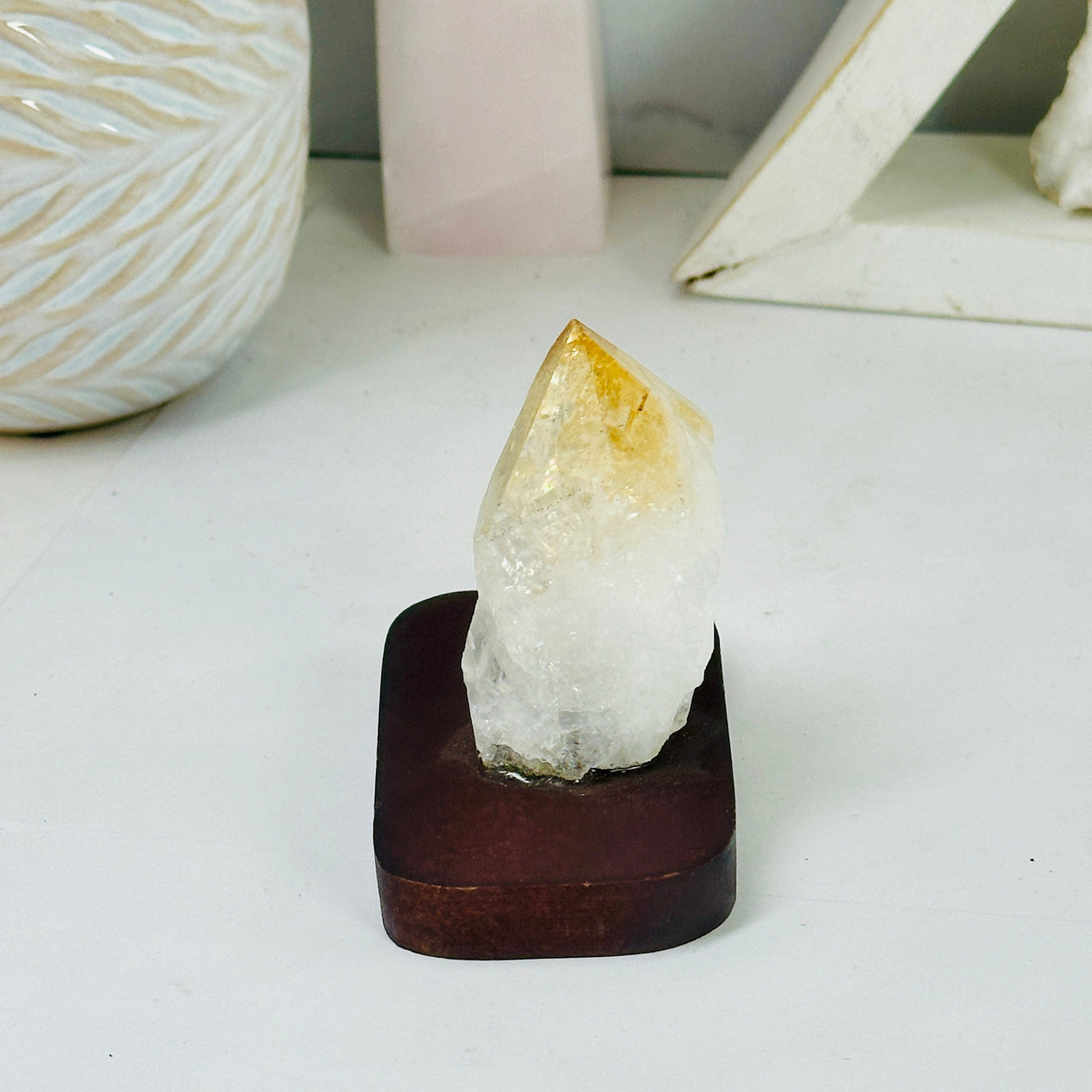 Citrine Point on Wooden Base side view
