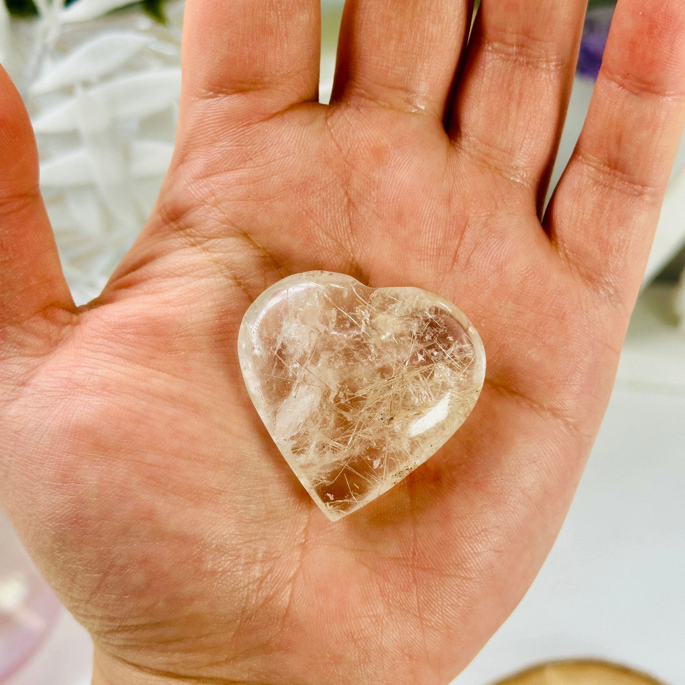 Rutilated Quartz Heart - Crystal Heart - OOAK in hand for size reference