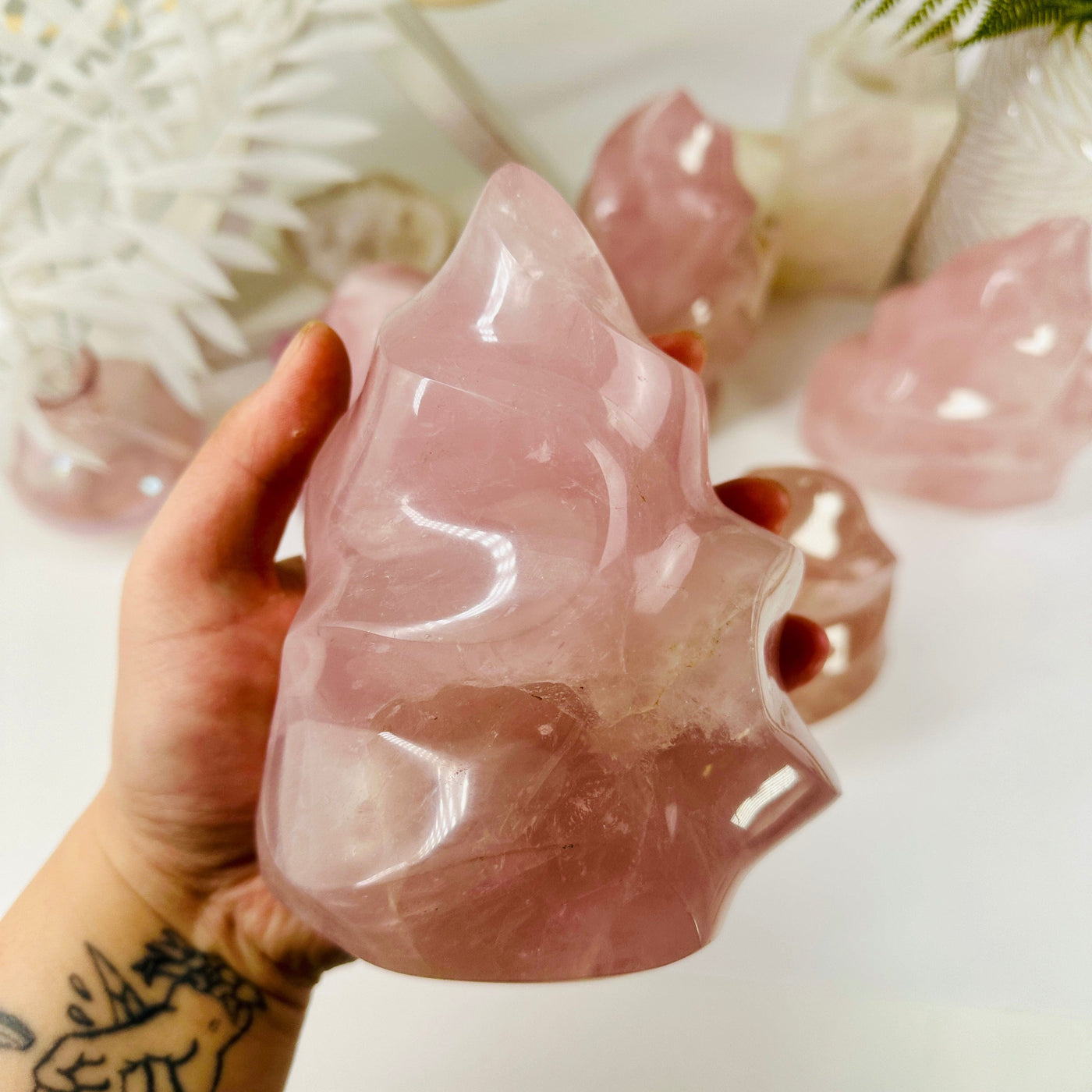 Rose Quartz Flame Tower - Carved Crystal - You Choose variant A in hand for size reference