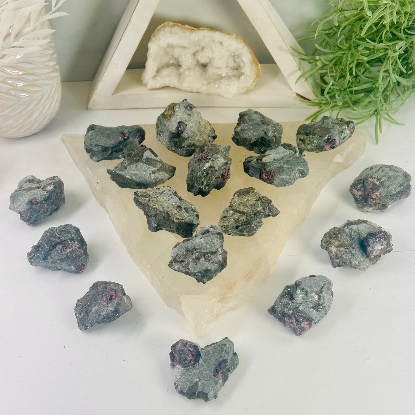 Garnet on Hematite Matrix - Natural Crystal all stones arranged on and around quartz platter