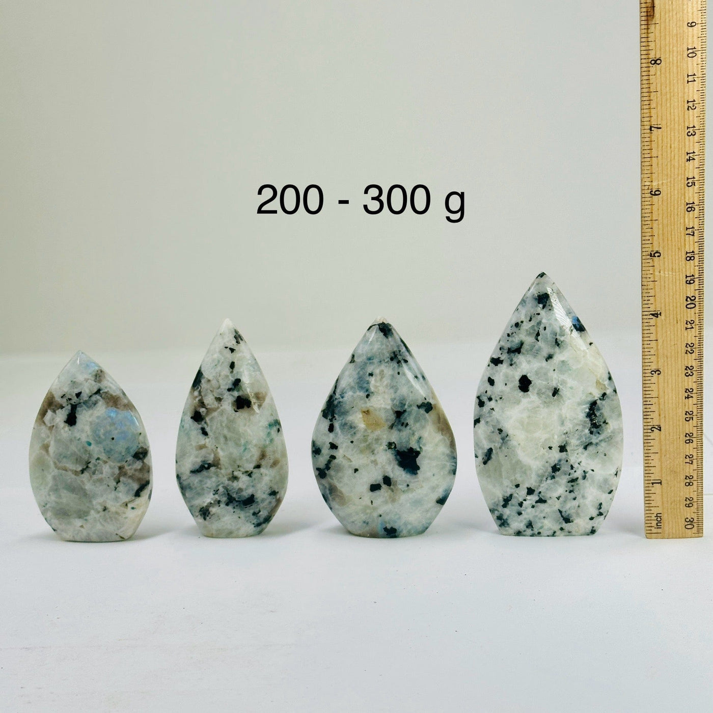 Moonstone Freeform Cut Base - By Weight 200 - 300 grams labeled with ruler for size reference