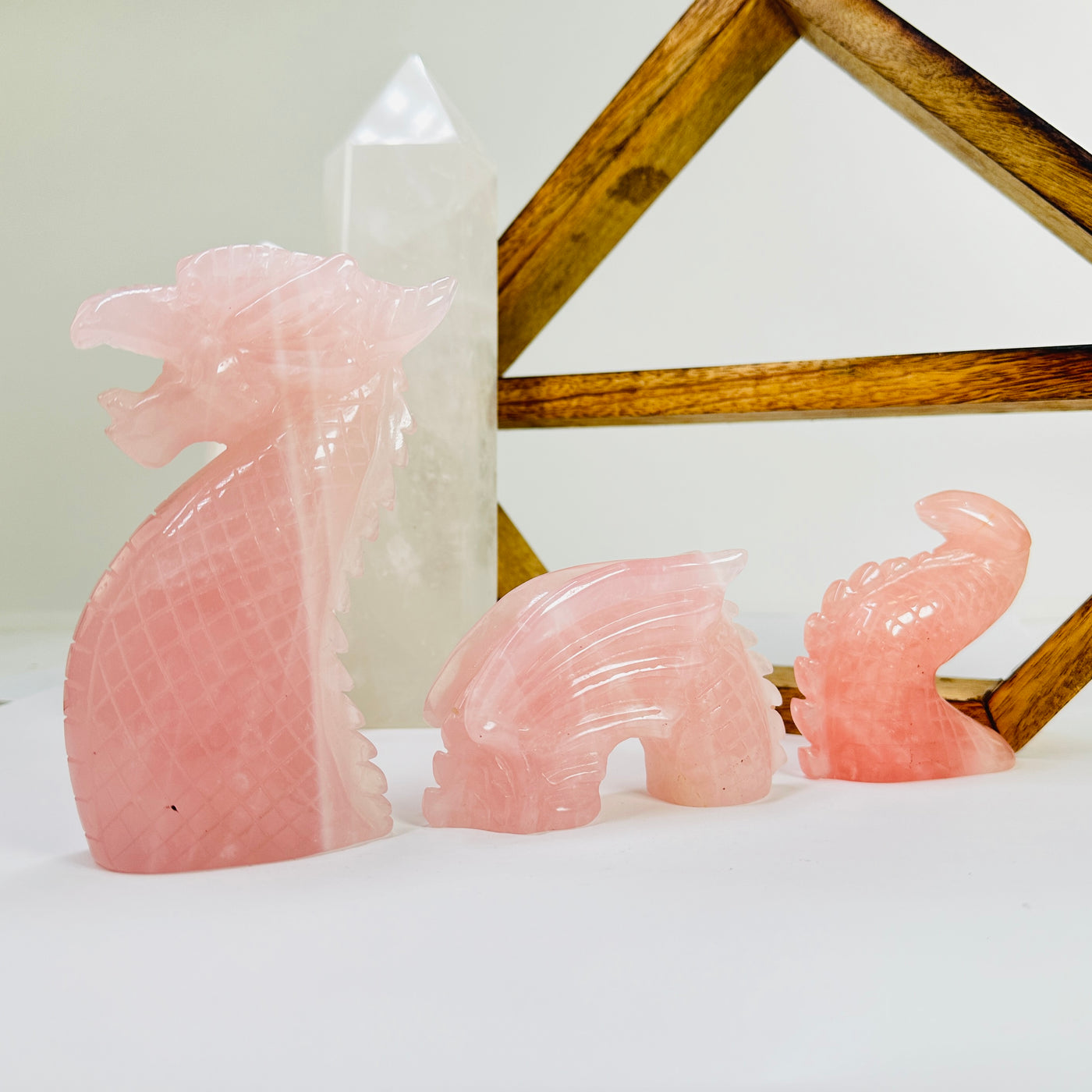 rose quartz dragon with decorations in the background