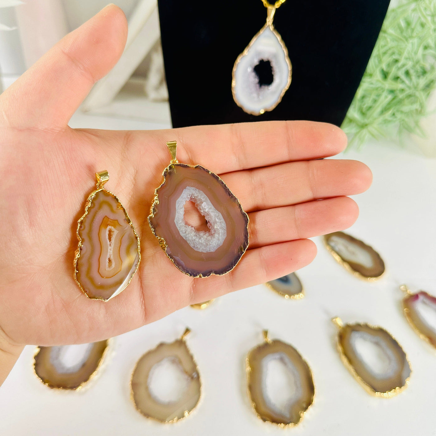 Agate Slice - Gold Electroplated Pendant with Gold Bail - You Choose agate pendant 3 and 9 in hand for size reference with other pendants in background