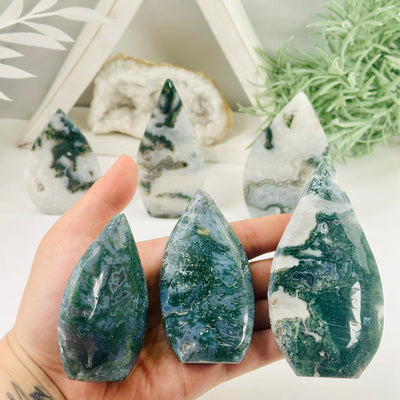 Moss Agate Freeform Cut Base - By Weight 3 weights in hand with 3 weights in background