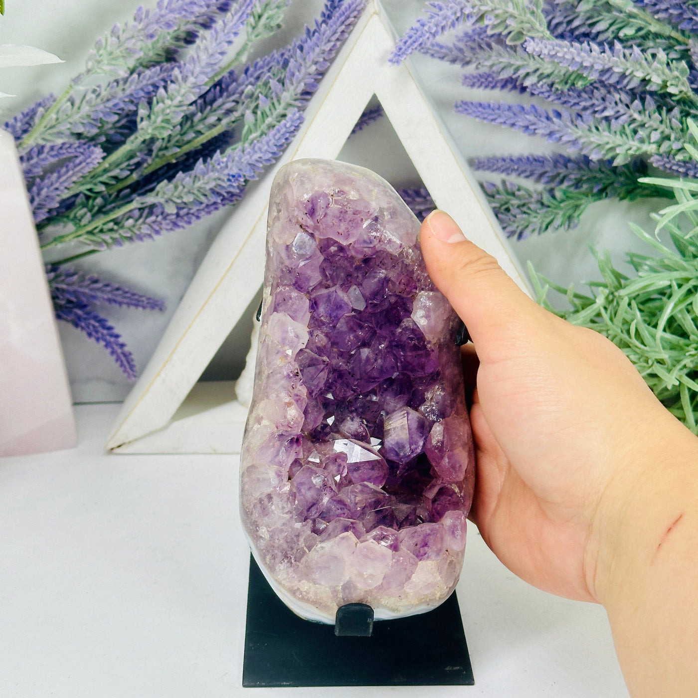 Amethyst Cluster on Black Metal Stand - Polished Crystal Cluster with hand for size reference