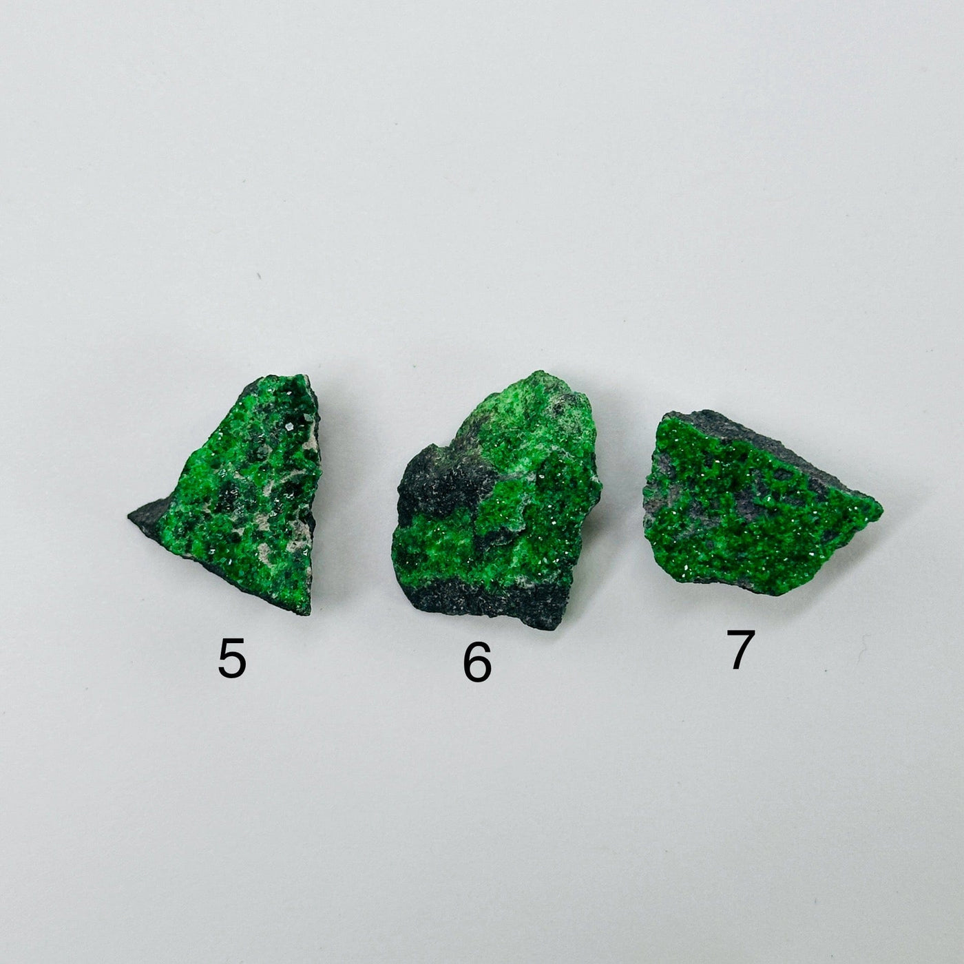 uvarovite pieces on white background