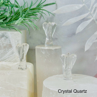 Gemstone Angels - Medium 3 crystal quartz angels on pedestals at different angles labeled