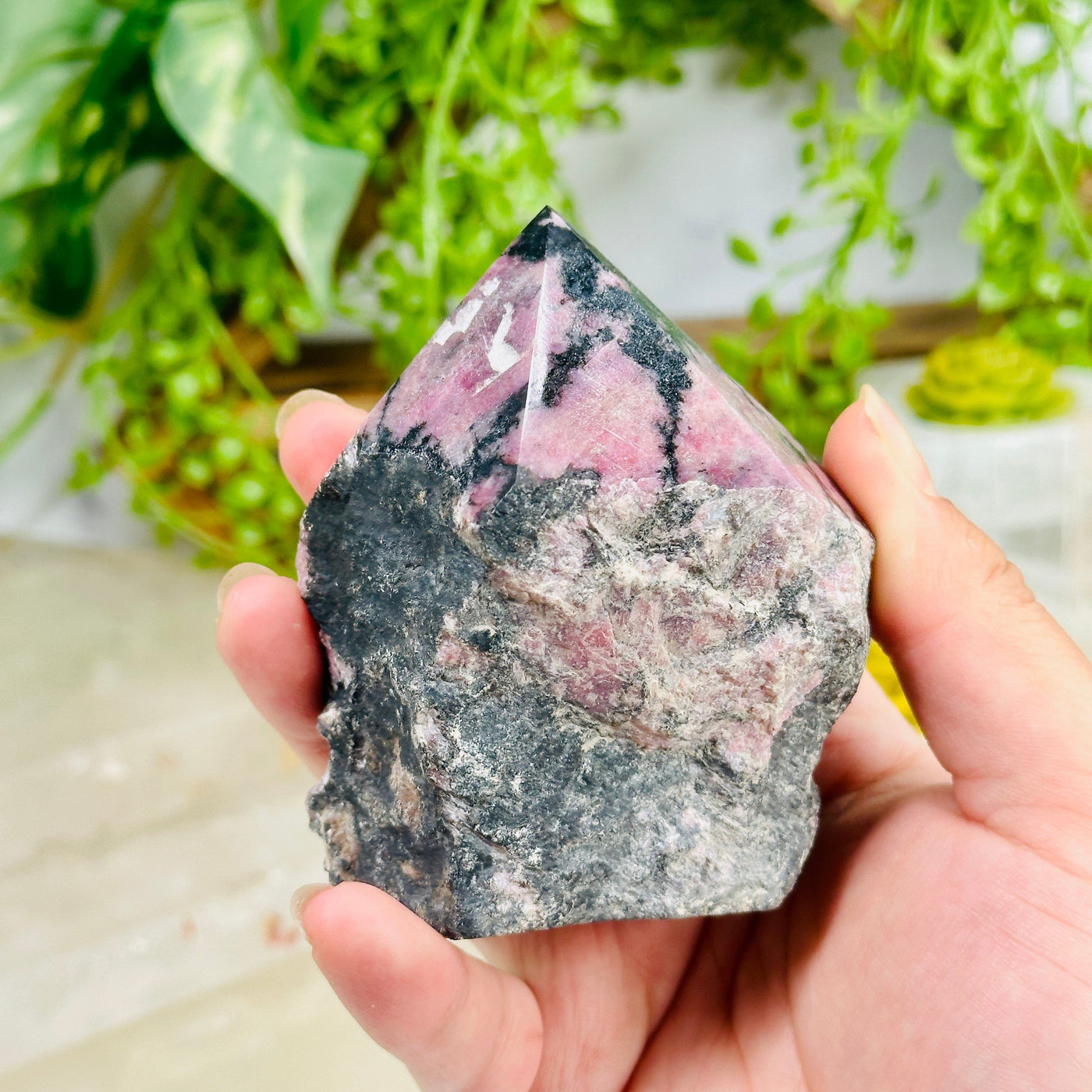 Rhodonite Semi-Polished Point - Crystal Point - OOAK in hand for size reference