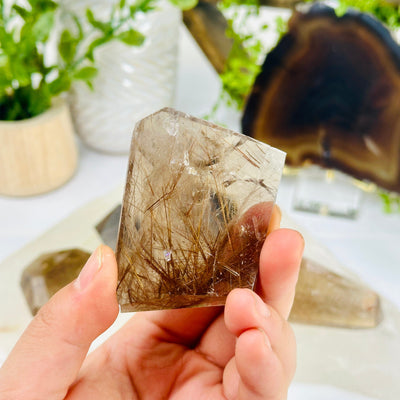 Rutilated Smokey Quartz - Polished Freeform Crystal - You Choose variant 3 in hand for size reference with other variants in background