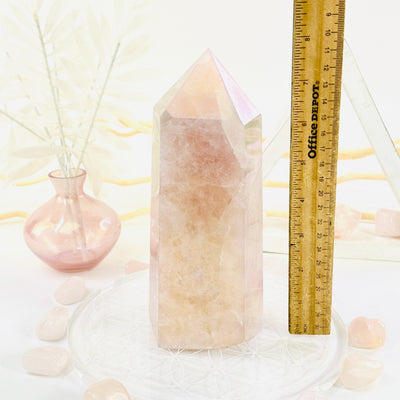 Angel Aura Rose Quartz Polished Point with Natural Inclusions next to ruler for size reference