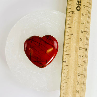 Red Jasper Polished Heart front view with ruler for size reference