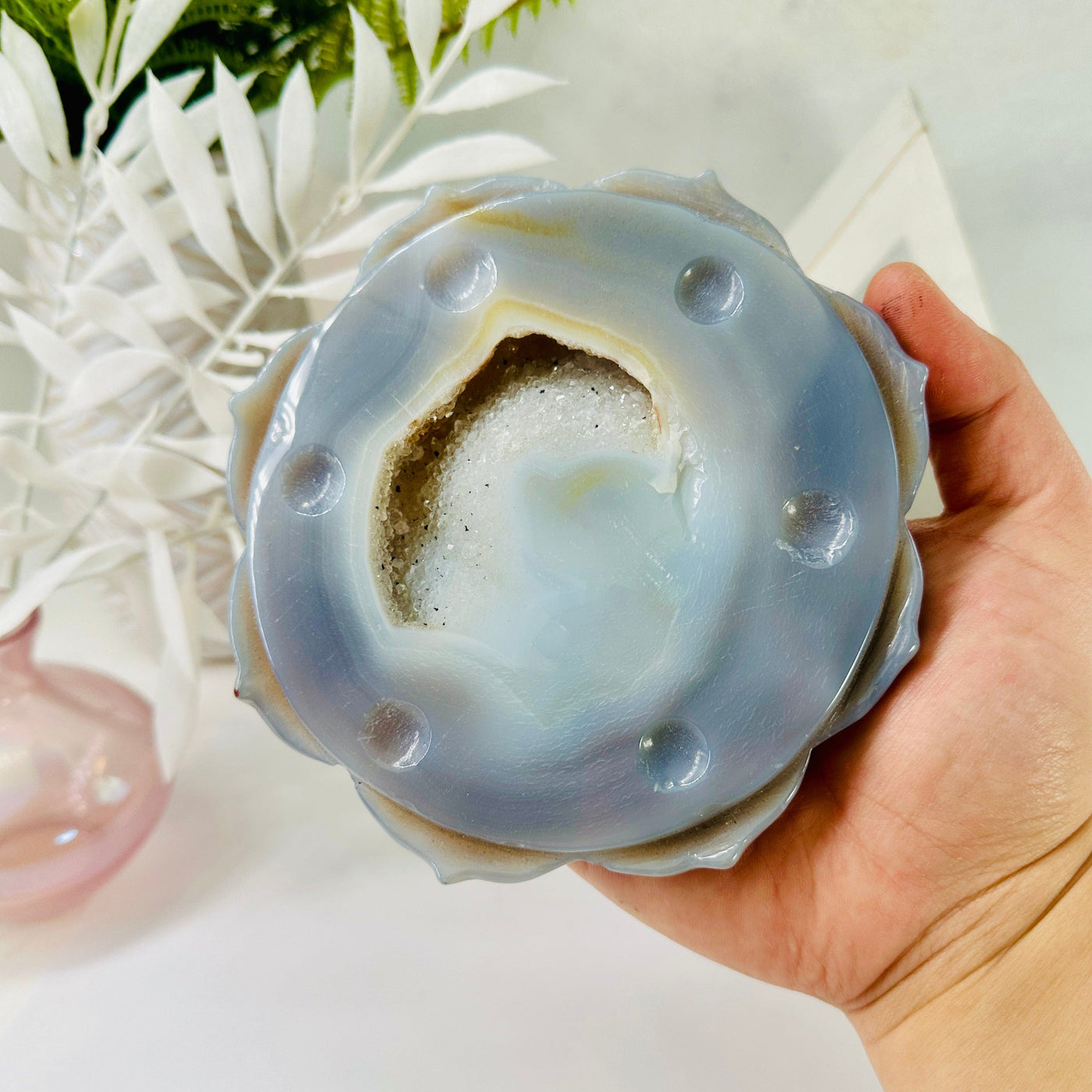 Natural Agate - Carved Polished Crystal Flower Coaster in hand for size reference