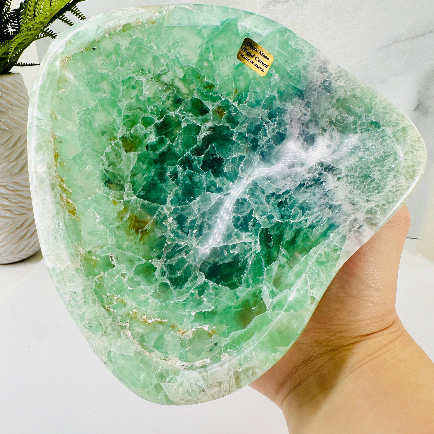 Fluorite Crystal Freeform Bowl in hand for size reference