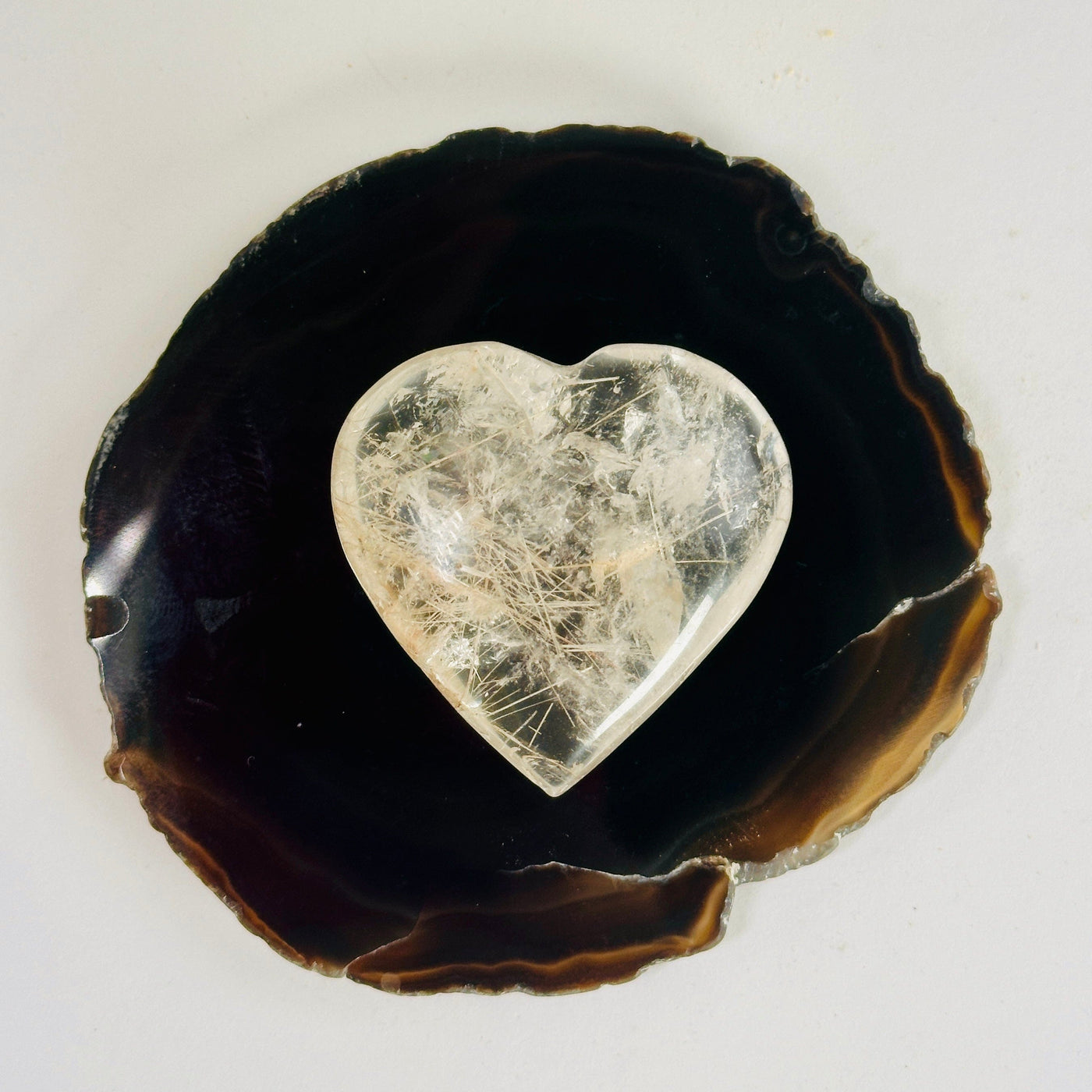 Rutilated Quartz Heart - Crystal Heart - OOAK on black agate front view