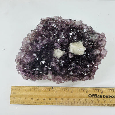 Amethyst Crystal Cluster - amethyst rough stone top view with ruler for size reference