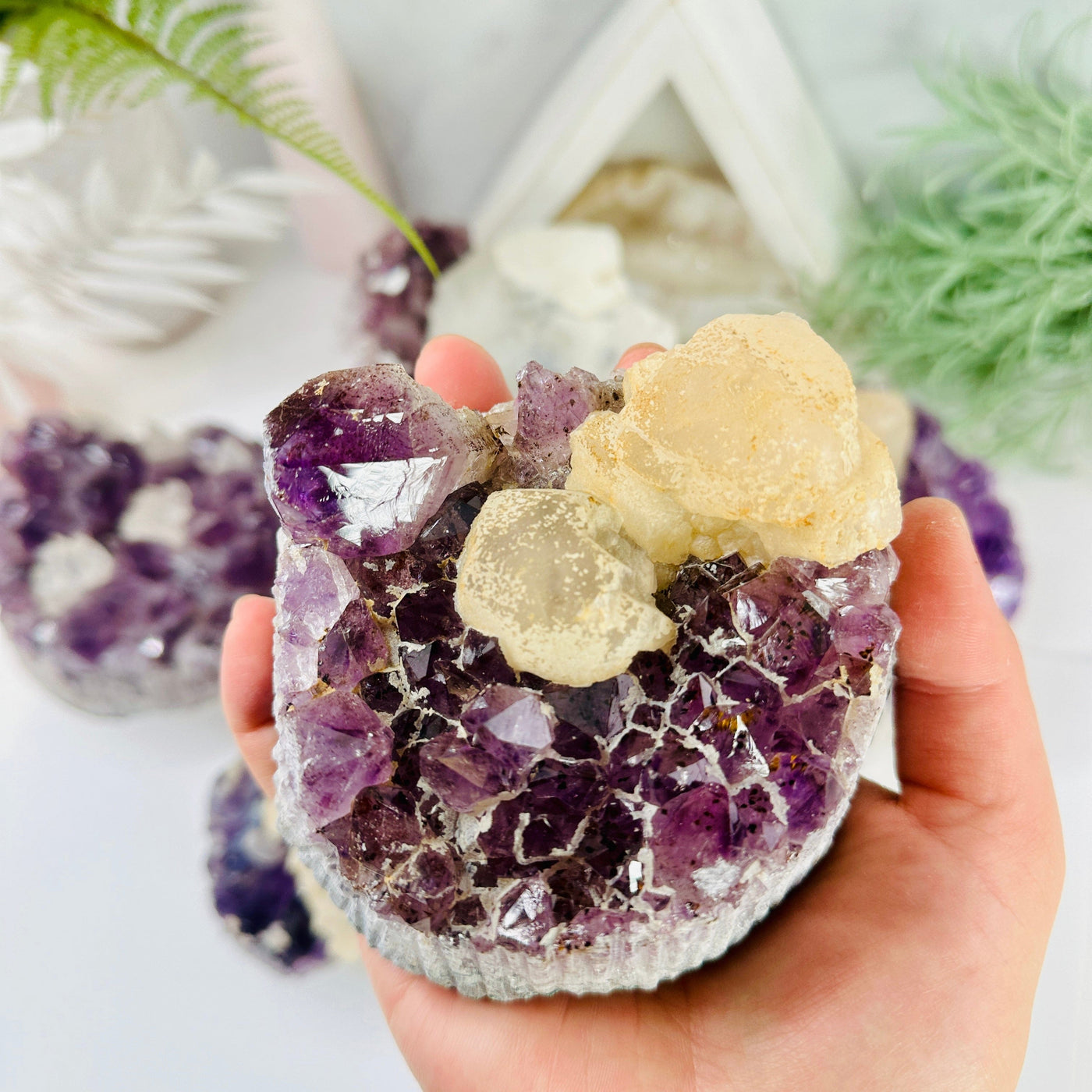 Amethyst Crystal Clusters - You Choose variant A in hand for size reference