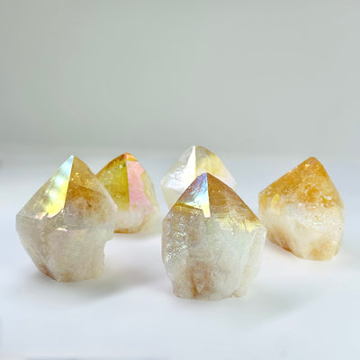 Angel Aura Citrine Crystal Points with a white background.