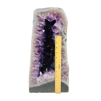 amethyst cathedral next to a ruler for size reference