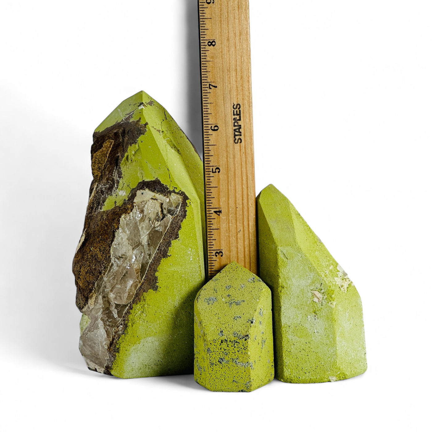 Nontronite Crystal Points next to a ruler for size reference.