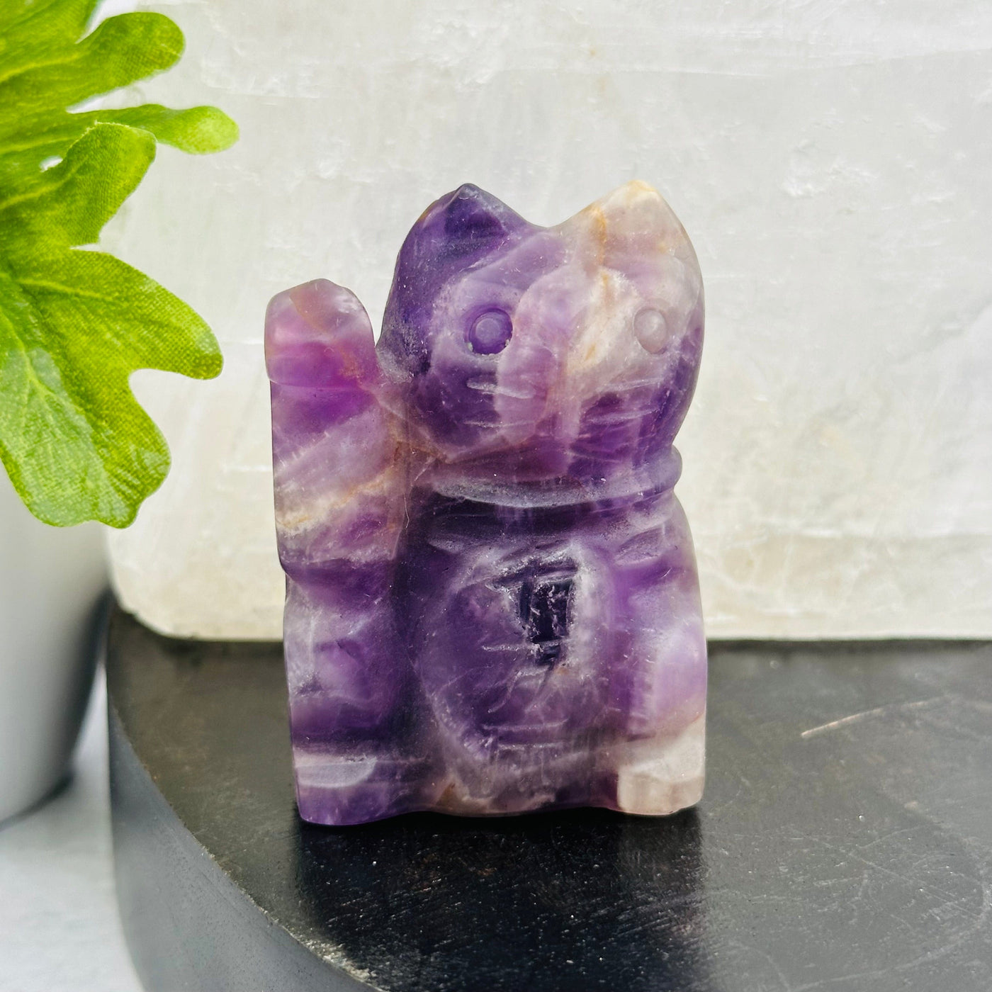 carved crystal cat displayed as home decor 