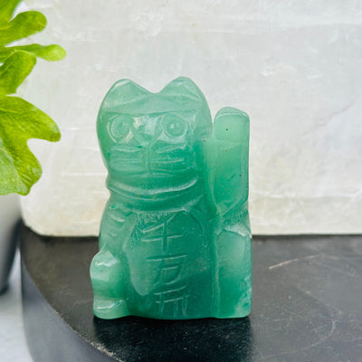 Lucky Crystal Cats - Carved Stone displayed as home decor 