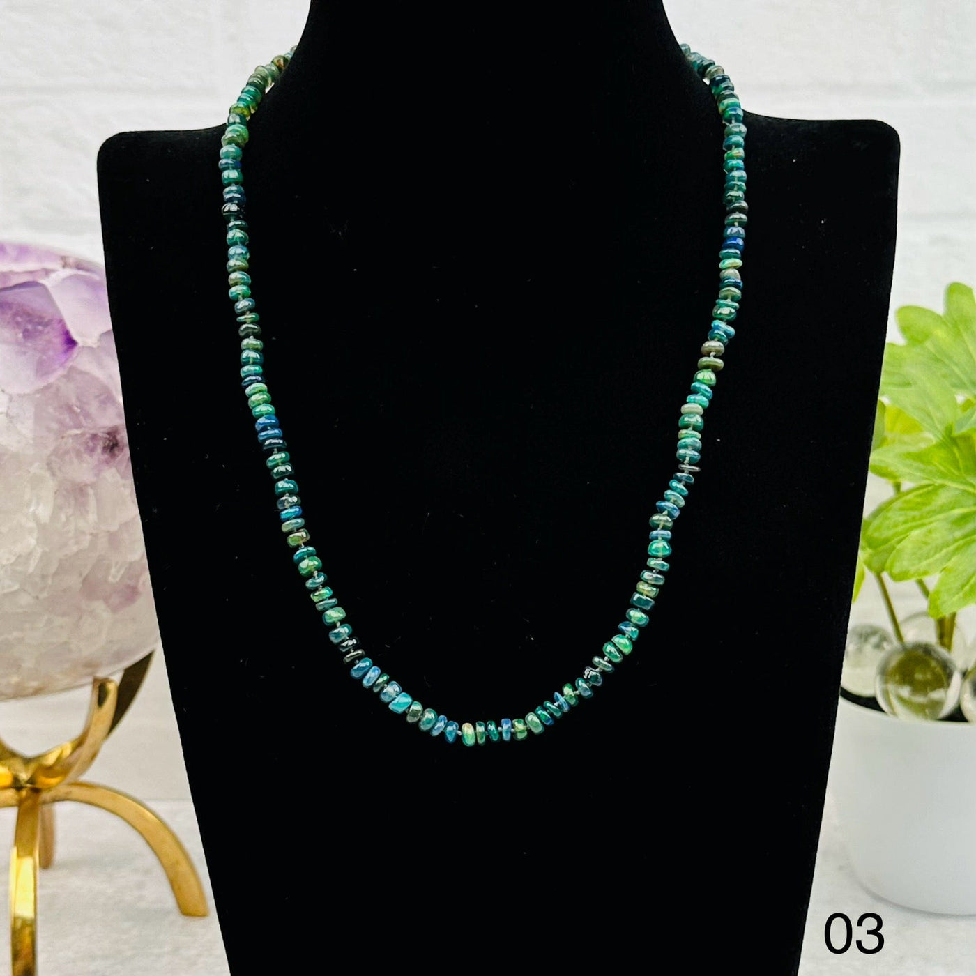 option 03 is for this dark green necklace 