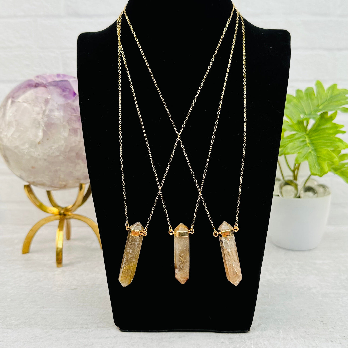 multiple necklaces displayed to show the differences in the color shades 