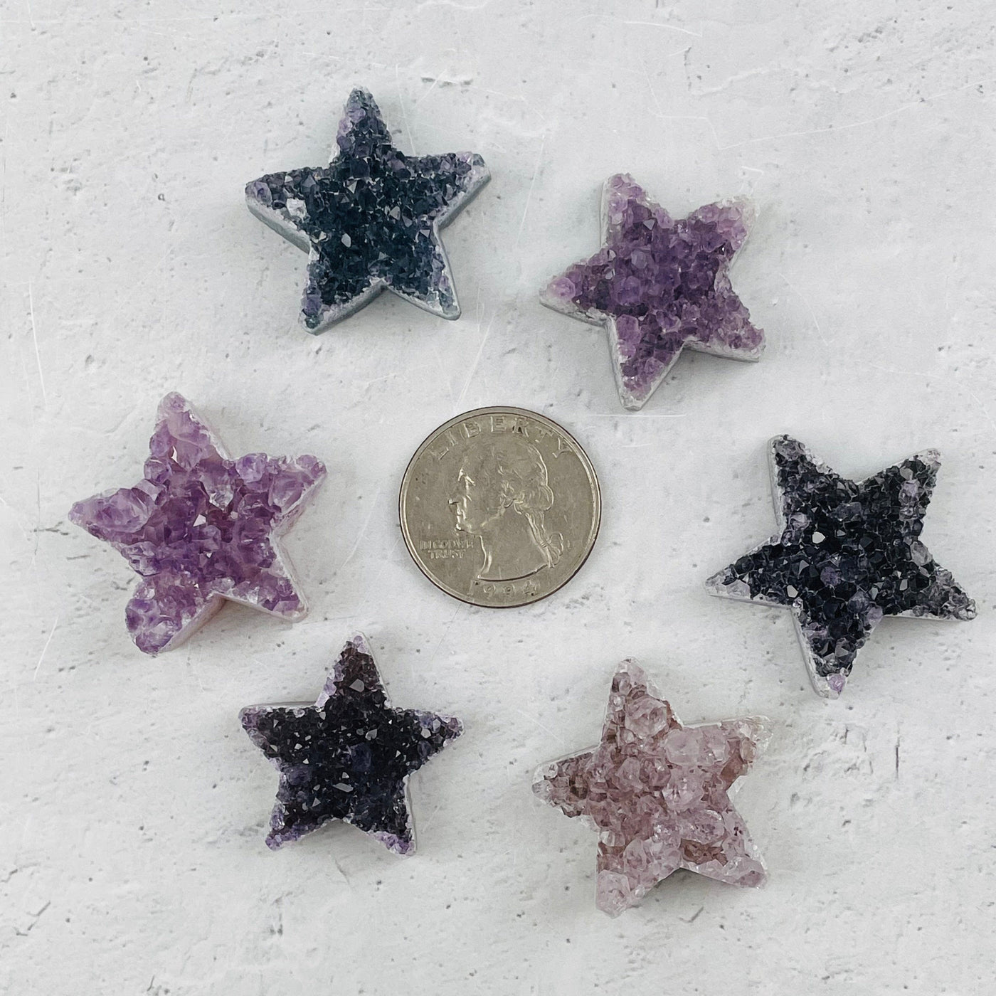 stars next to a quarter for size reference 