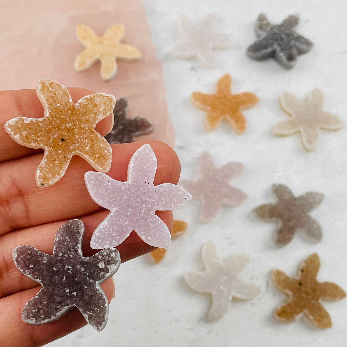 Druzy 30mm Starfish Shaped Cabochons in hand for size reference 