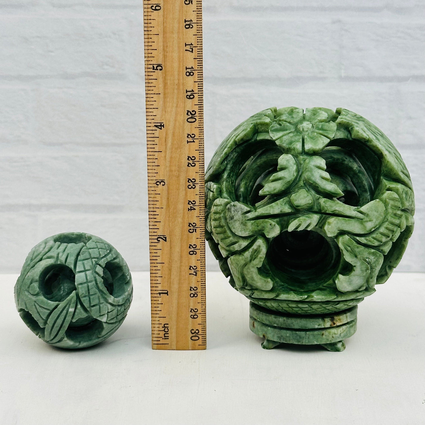 Carved Jade Puzzle Ball - Good Luck Charm - You Select Size next to a ruler for size reference 