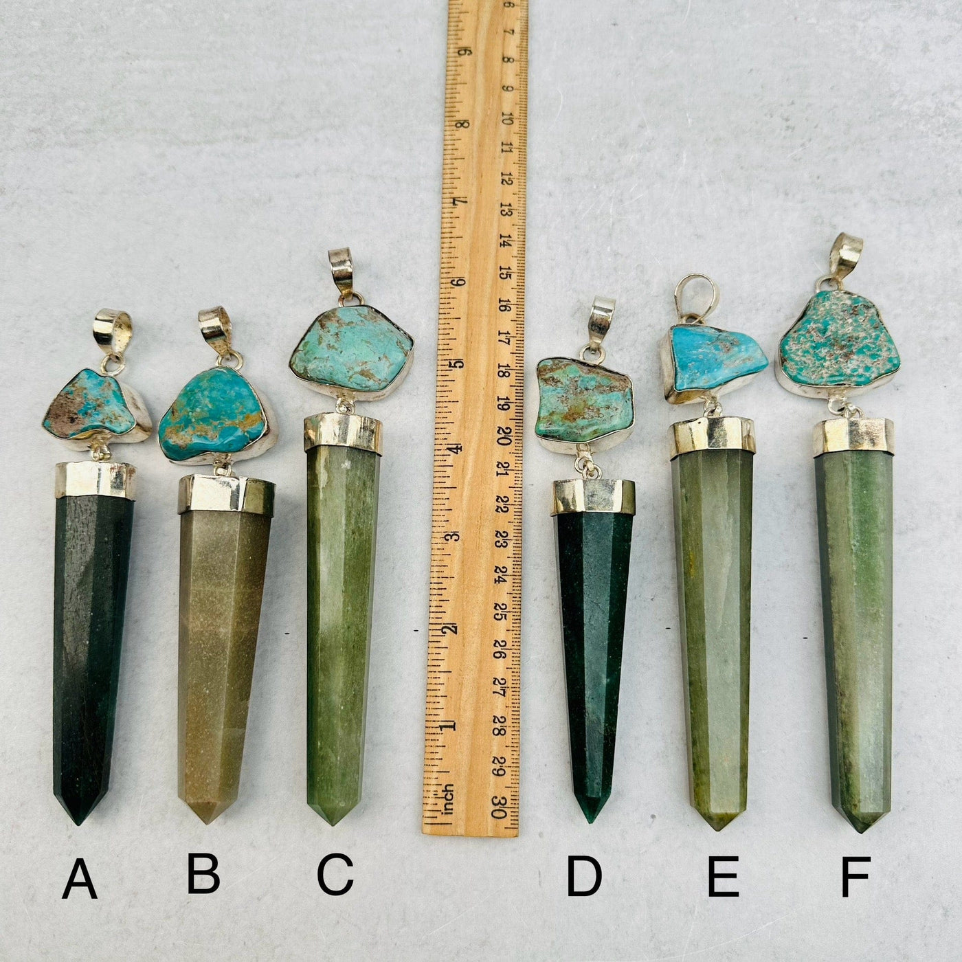 you select your favorite one, pendants next to a ruler for size reference 