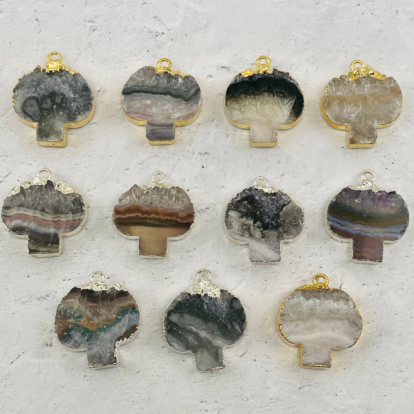 multiple pendants displayed to show the differences in the color shades
