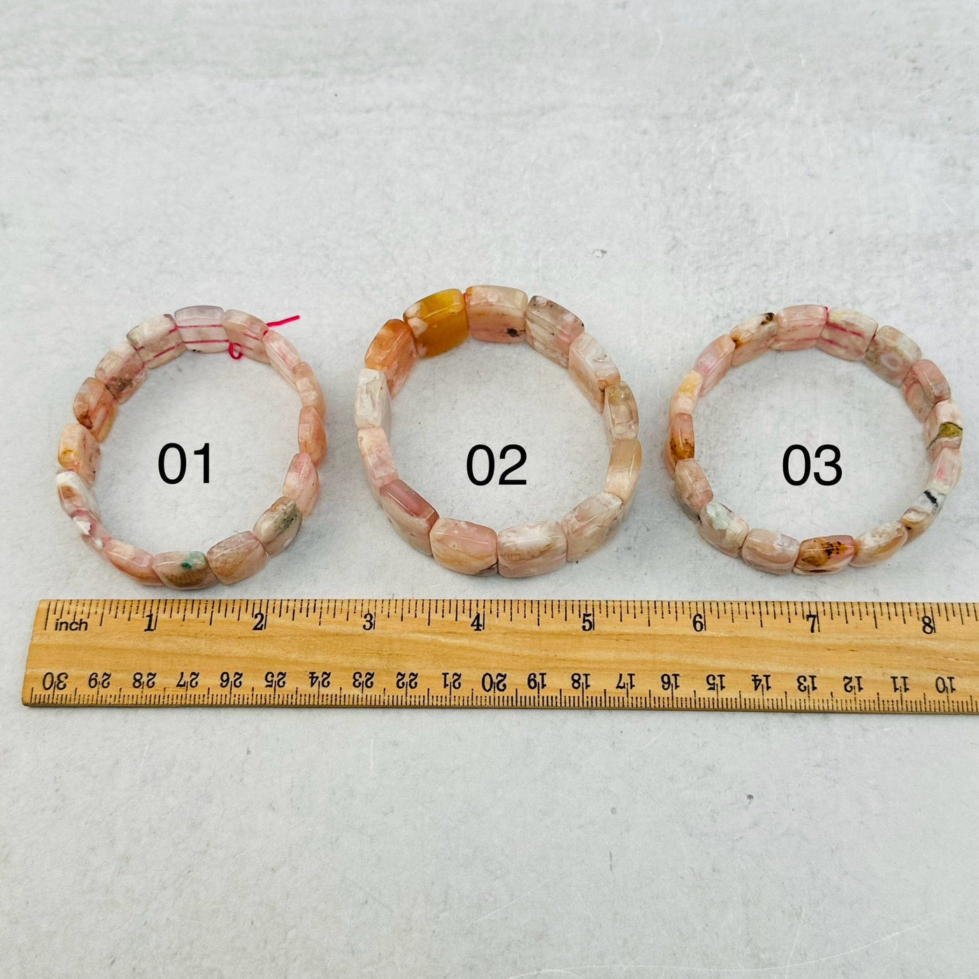 you select your favorite one. bracelets next to a ruler for size reference 