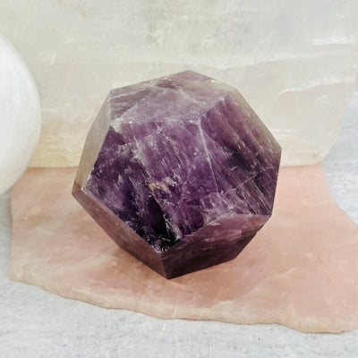 Amethyst Crystal Dodecahedron displayed as home decor 