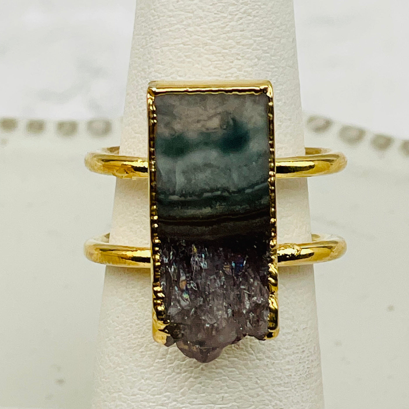 close up of the amethyst slice on this ring