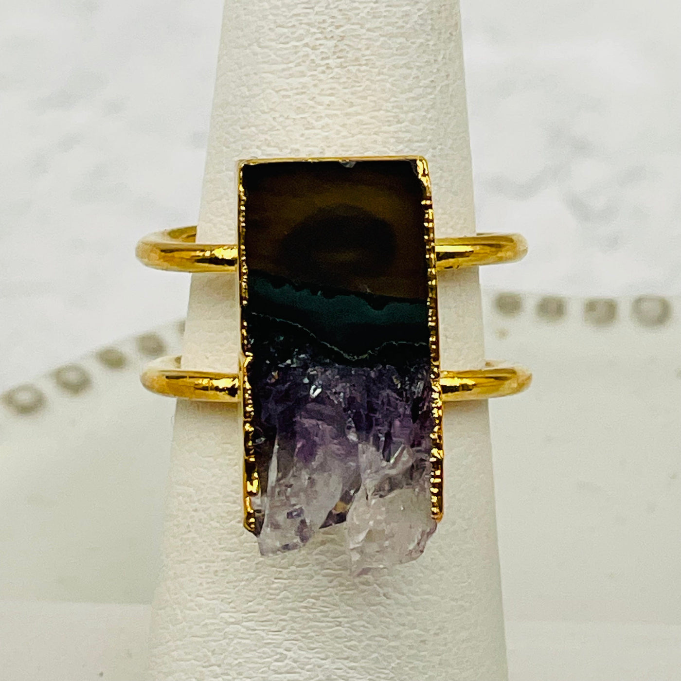 close up of the amethyst slice on this ring
