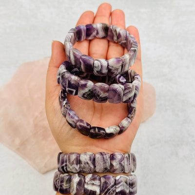 Chevron Amethyst Bracelets in hand for size reference 