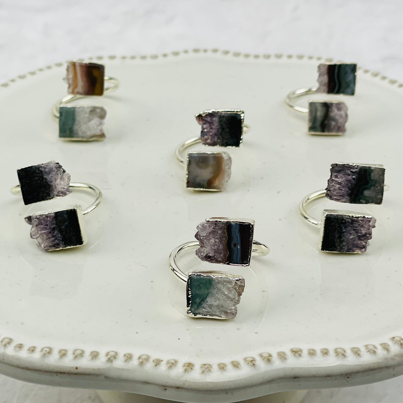 multiple rings displayed to show the differences in the color shades. available in silver