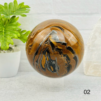 Tigers Eye with Hematite Polished Spheres - You Choose - option 02 displayed s home decor