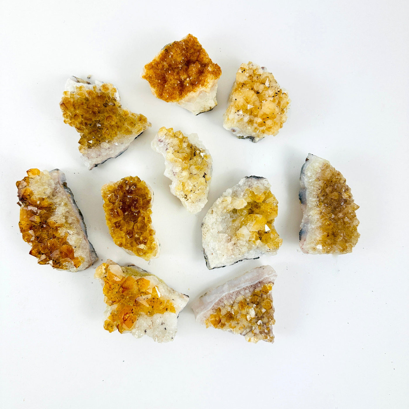 Citrine Crystal Clusters on a table to show all