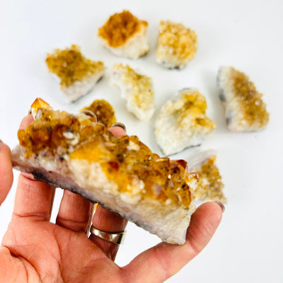 Citrine Crystal Clusters  with 1 in a handup close