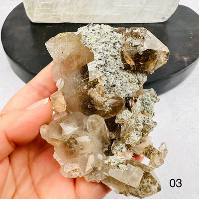 Natural Smoky Quartz Cluster with Rutilated inclusions. Option 03 in hand for size reference