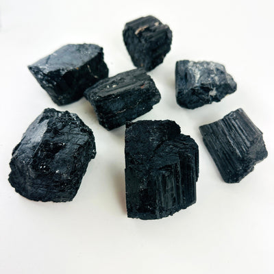 7 Tourmaline Crystal Chunks on table