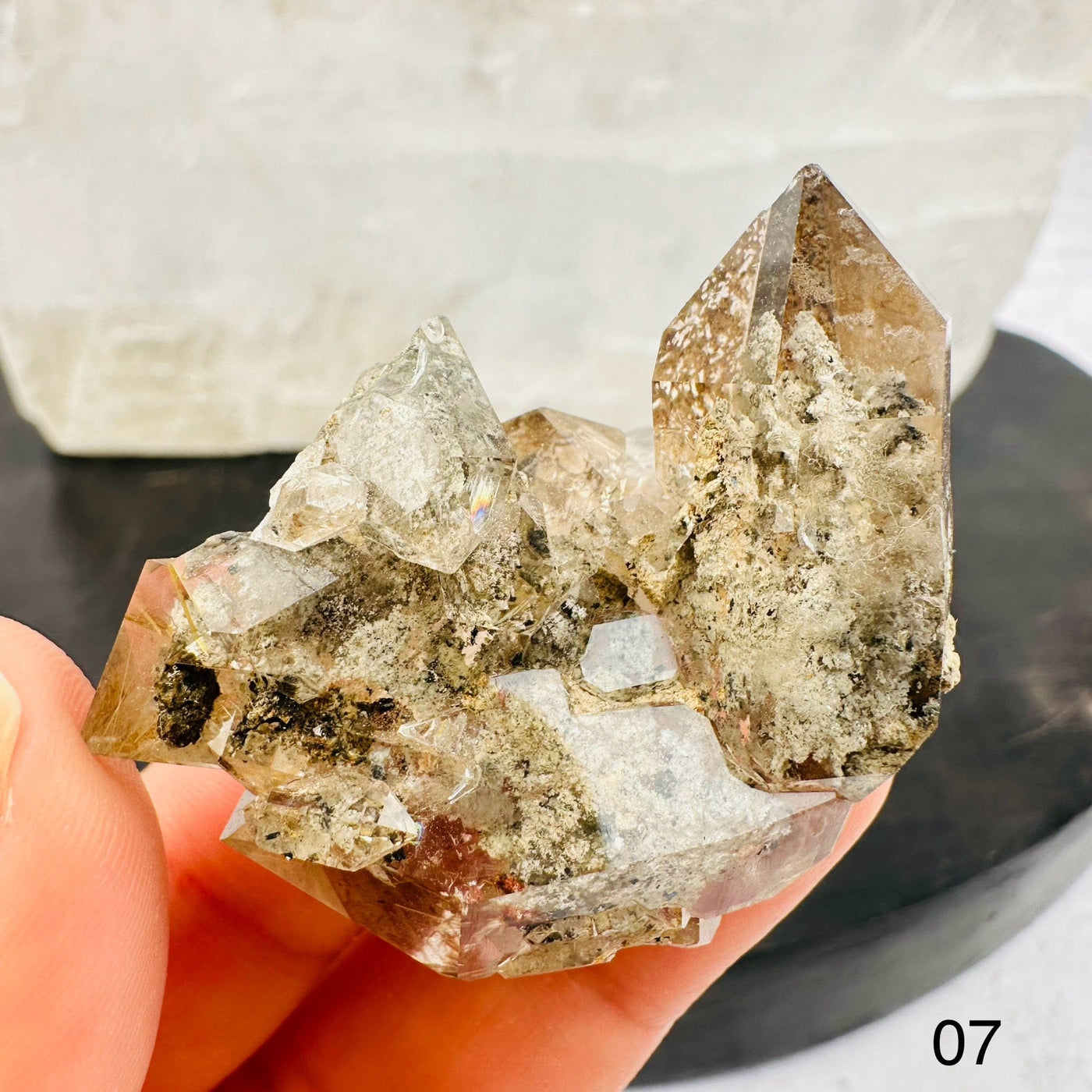 Natural Smoky Quartz Cluster with Rutilated inclusions. Option 07 in hand for size reference