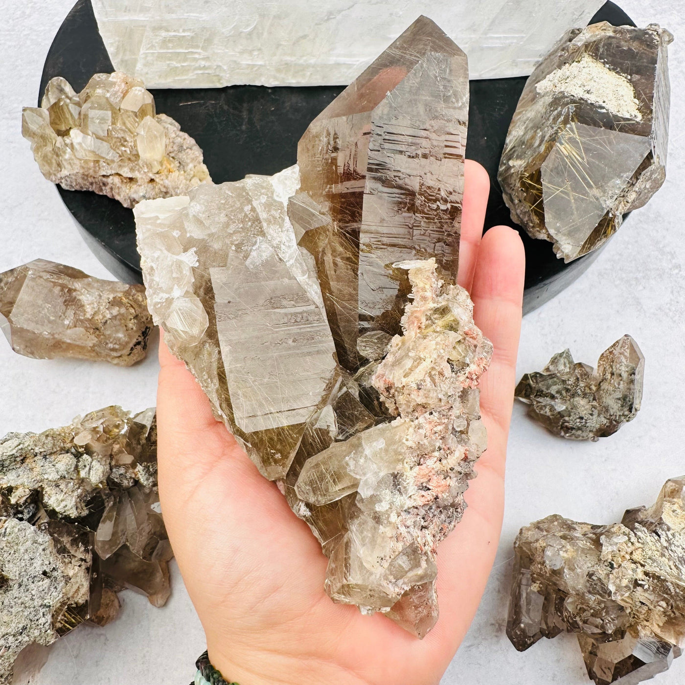Natural Smoky Quartz Cluster with Rutilated inclusions - High Quality in hand for size reference 