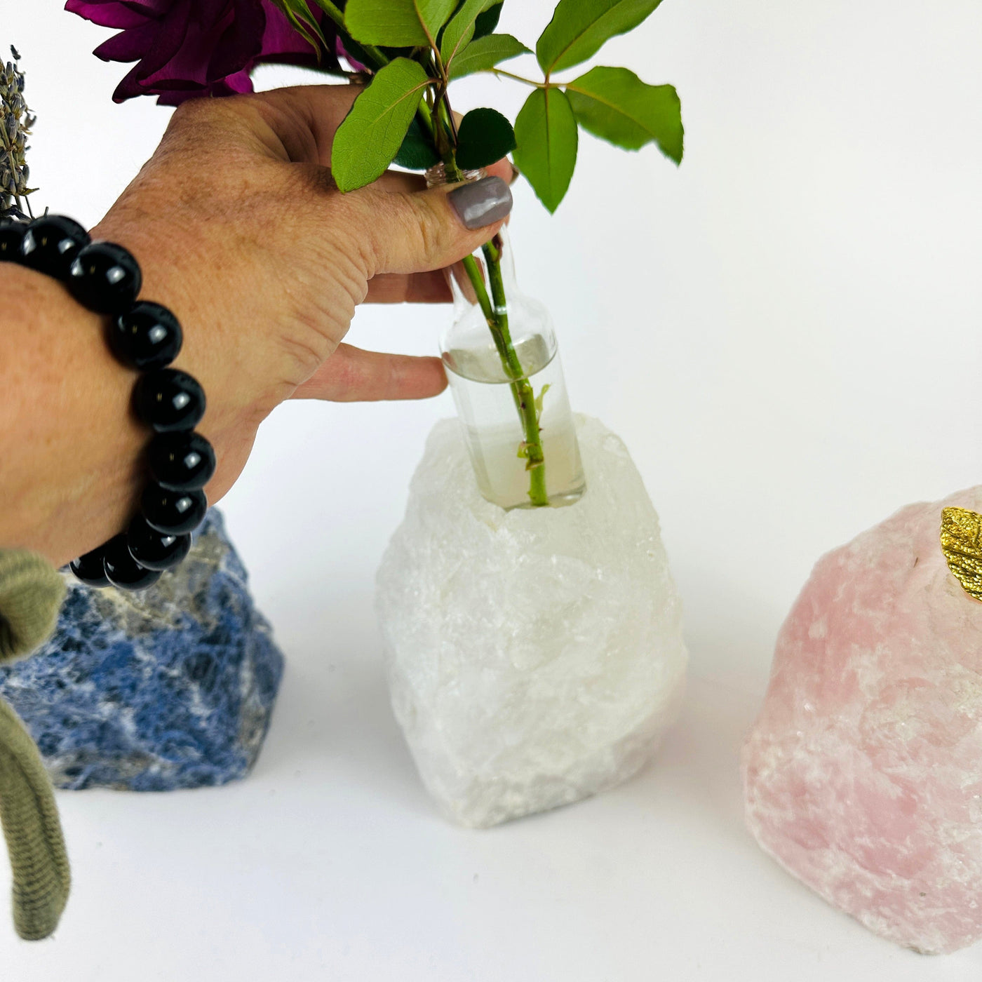 Natural Stone Vase showing how a glass vessel can be added to hold water