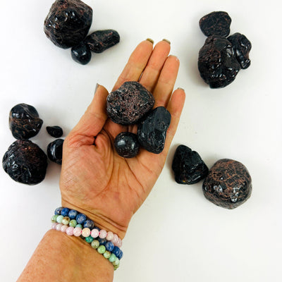 Tumbled Garnet Crystals with a set in the and for size reference