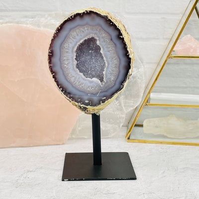 natural geode on stand displayed as home decor