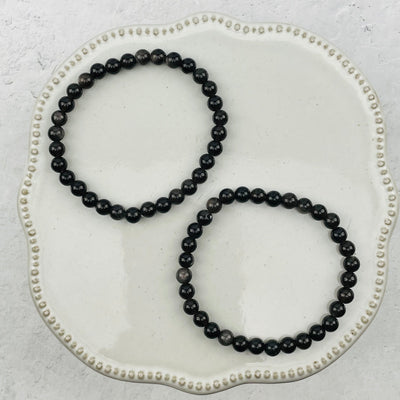 bracelets displayed to show the differences in the sheen 